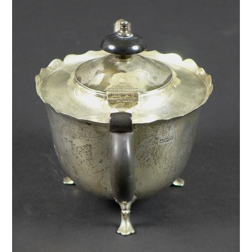 2 - An early 20th century small silver teapot, with ebony handle and finial, Mappin and Webb, Sheffield,... 