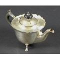 An early 20th century small silver teapot, with ebony handle and finial, Mappin and Webb, Sheffield,... 