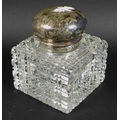 A Victorian silver topped cut glass perfume bottle, by Army & Navy Cooperative Society Ltd, London 1... 