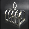 A George VI silver four division toast rack, with shaped carry handle, Viners Ltd, Sheffield 1940, 9... 