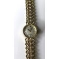 An 18ct gold Rolex Precision lady's bracelet wristwatch, circa 1980s, circular patterned champagne d... 