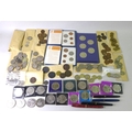 A collection of UK coins, including a £5 coin commemorating the Queen Mother, 2000, three £1 coins, ... 