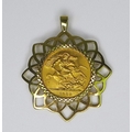 An Elizabeth II gold sovereign, 1959, in a 9ct gold pendant setting, 3.8cm, 12.2g total.