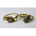 Private Collection-Vintage and Modern design rings: Two 9ct gold, diamond and sapphire rings, the fi... 