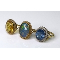 Private Collection-Vintage and Modern design rings: Three 9ct gold rings set with oval stones, the f... 