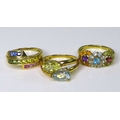 Private Collection-Vintage and Modern design rings: A group of three 9ct gold rings set with coloure... 