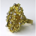 Private Collection-Vintage and Modern design rings: An 18ct gold and diamond dress ring of modernist... 