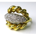 Private Collection-Vintage and Modern design rings: An 18ct gold and diamond ring of 1980s design, f... 