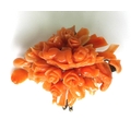 A 19th century coral brooch unusually carved with a cherub amongst roses, a dove carved to one side,... 