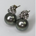 A pair of 18ct white gold and grey South Sea pearl earrings, each approx 10.5mm diameter and crowned... 