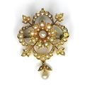A Victorian 18ct gold and seed pearl brooch/pendant, quatrefoil design with drop pearl to base, 6.6g... 