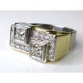 An 18ct gold and diamond Art Deco style ring, formed as two old cut diamonds each of approximately 0... 