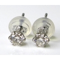 A pair of platinum and diamond stud earrings, the brilliant cut stones of approximately 0.3ct combin... 