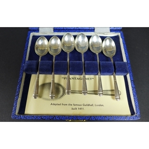 18 - A group of four cased silver Christening sets, including a twin handled sugar bowl, 1922 and tongs, ... 