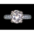 A large and impressive platinum and diamond solitaire ring, the brilliant cut diamond approximately ... 