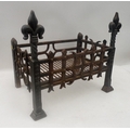 A cast iron grate, 54 by 32 by 46cm high.