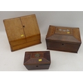A group of three wooden boxes, comprising an Edwardian oak desk top letter cabinet, a Georgian mahog... 
