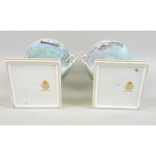 43 - A pair of modern Royal Worcester pedestal vases, twin foliate scrolled handles, one decorated with a... 