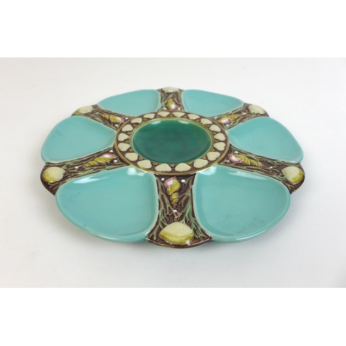 37 - A set of eight Minton majolica oyster plates, circa 1870, shape 1323, each modelled with six shallow... 