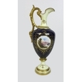 An Edwardian Coalport porcelain ewer, shape 149, modelled with foliate scroll handle, shaped spout, ... 
