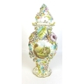 A late 19th century encrusted polychrome porcelain vase and cover, in Coalbrookdale style, of balust... 
