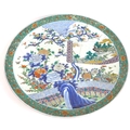 A Chinese porcelain famille verte charger dish, early 20th century, decorated in Kangxi style with b... 