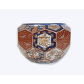 A Japanese porcelain Imari pattern jardiniere, of a multi-faceted hexagonal form, decorated with cra... 