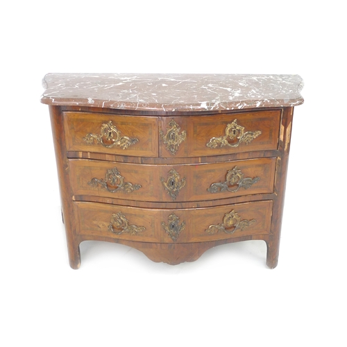 389 - A French Louis XVI commode, late 18th century, with bow front and sides, rouge griotte marble surfac... 