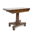 A early Victorian rosewood and mahogany card table, fold over surface, on tapering column and platfo... 