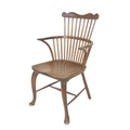A late 18th century Lancaster comb back Windsor chair, in elm and oak, with later cabriole legs term... 