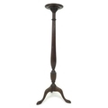 A mid 20th century mahogany jardiniere stand, dished circular surface, turned column, three cabriole... 
