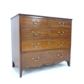 A late George III mahogany chest of drawers, the two short over three long graduating drawers with b... 