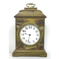 A 20th century mantel clock, Chinoiserie decorated against a gold ground, the white dial with black ... 