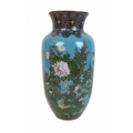 A 19th century Japanese cloisonne lantern form vase, decorated with blossom and butterfiles against ... 