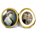 A 19th century pastel portrait of a lady, 58cm oval, together with another pastel portrait of two yo... 