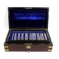An Edwardian rosewood Weiss surgical instruments case, containing eighty five ophthalmic and surgica... 