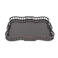 An Edwardian mahogany tray, of scalloped outline and with raised gallery rim on turned supports and ... 