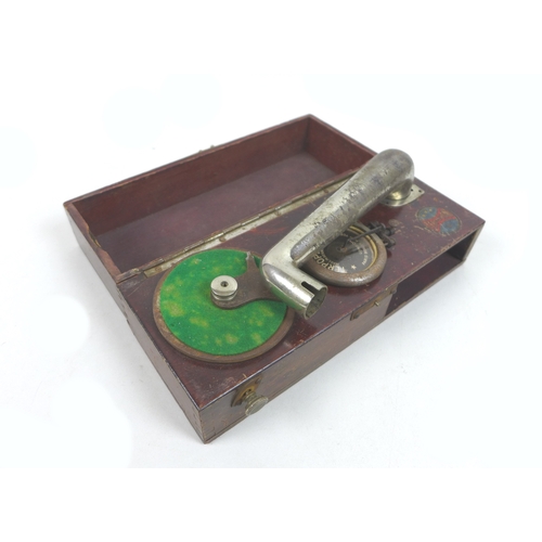 126 - An Edwardian terpophone, circa 1920, being a miniature phonograph, made in Germany, in a wooden box ... 