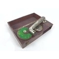 An Edwardian terpophone, circa 1920, being a miniature phonograph, made in Germany, in a wooden box ... 