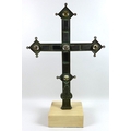 A Victorian bronze processional cross set with clear glass cabochons and wooden rectangular blocks, ... 