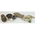 A Burmese carved stone shell and a group of ancient Roman and Greek ceramics and glass, the Burmese ... 