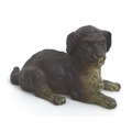 A 19th century cold-painted bronze sculpture, modelled as a recumbent dog, cast stamp 'Déposé' to ba... 