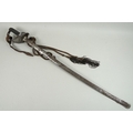 A late 19th century cavalry sword by Hamburger Rogers and Company, pierced decorated guard, wired sh... 