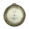 A WWI brass aneroid barometer, by F. Darton & Co, London, of circular form with silvered dial and br... 