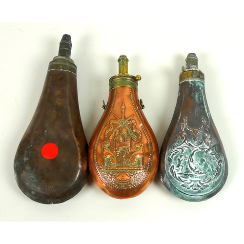 150 - Three brass and copper powder flasks, including one by J N N of Paris. decorated with game and hound... 