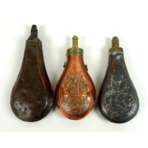 150 - Three brass and copper powder flasks, including one by J N N of Paris. decorated with game and hound... 