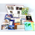 An album of WWI silk postcards and others, a smaller blue 1977 Silver Jubilee album of commemorative... 