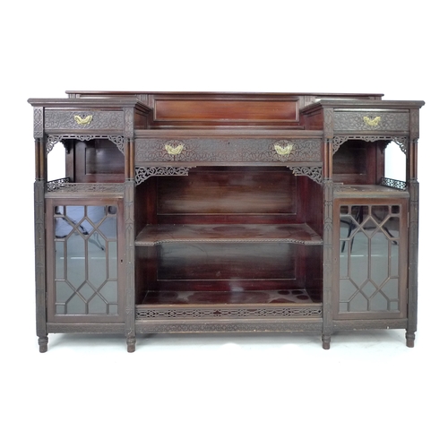 371 - A Gothic Revival mahogany sideboard, by Edwards & Roberts, circa 1890, with blind carved decoration,... 