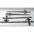 A pair of reproduction display distressed and aged medieval axes and two swords. (4)