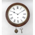 A 19th century oak cased school clock, with Roman numeral dial, movement stamped W & H, 32cm diamete... 